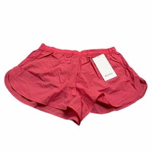 NWT Lululemon Dolphin-Hem Mid-Rise Running Short 3"
(Desert Red) Size Large